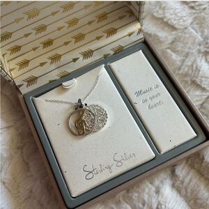 Elegant Gold and Silver Pendant Necklace